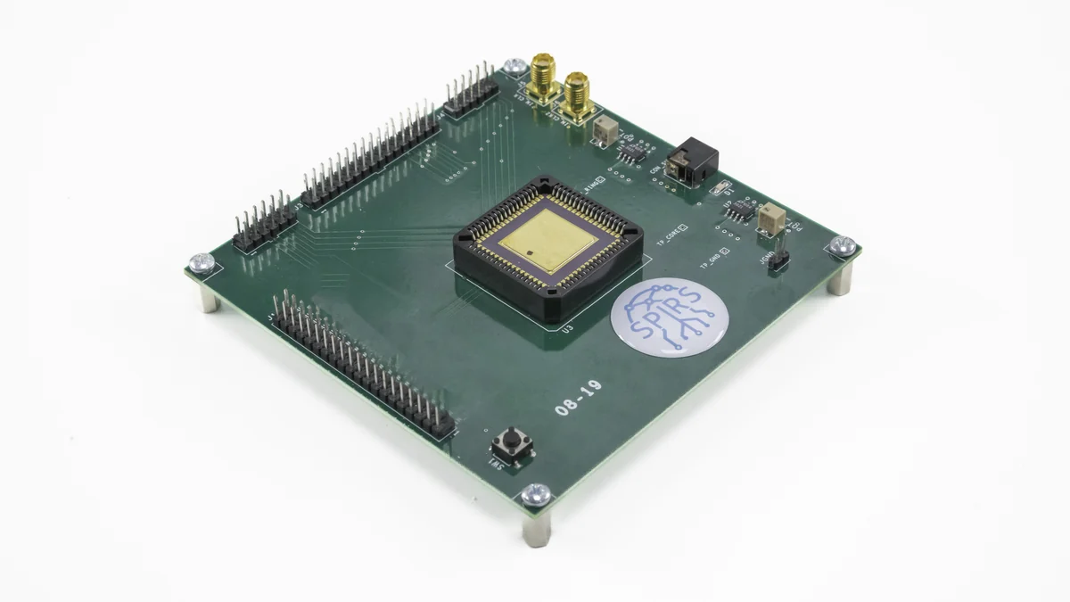 SPIRS evaluation board with a socketed chip and external connectors