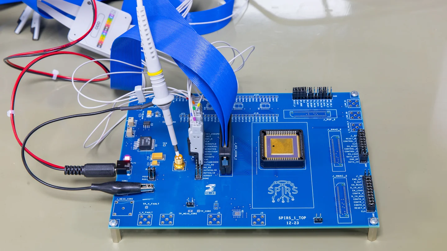SPIRS board connected to measurement probes and ribbon cables